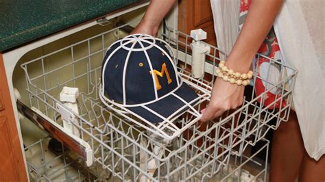 washing a baseball cap in dishwasher.